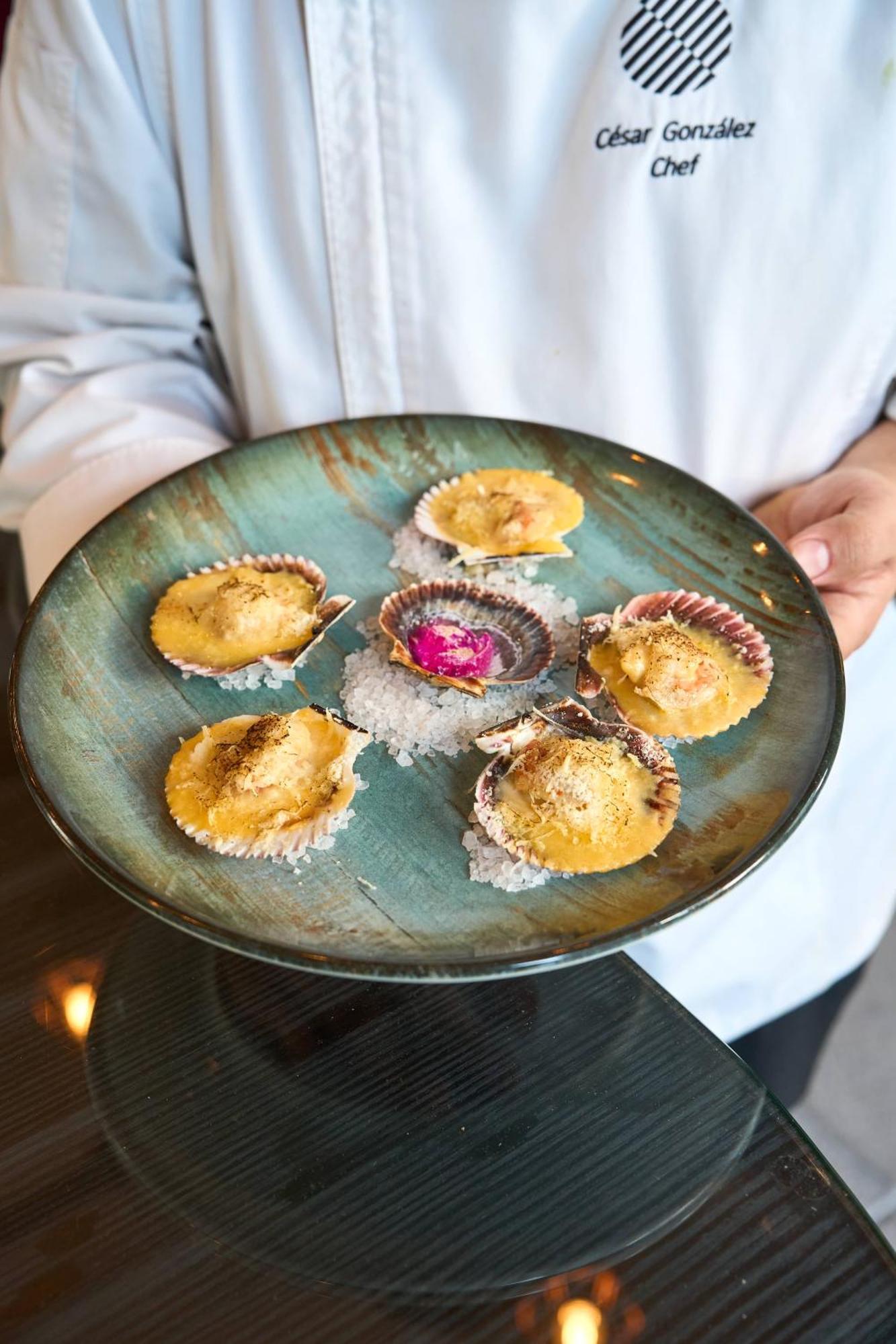 Pullman Santiago Vitacura Εξωτερικό φωτογραφία A plate of cooked scallops