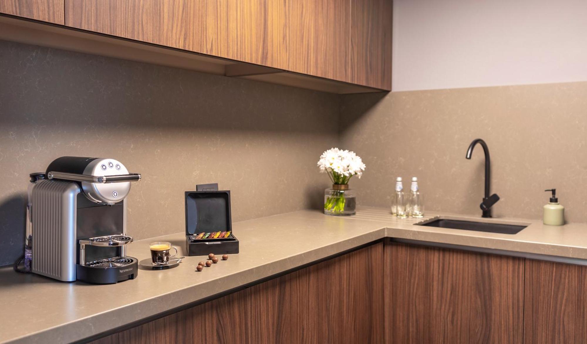 Pullman Santiago Vitacura Εξωτερικό φωτογραφία A Nespresso machine in a kitchen